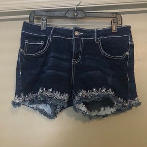 Dark Denim shorts with flower pattern